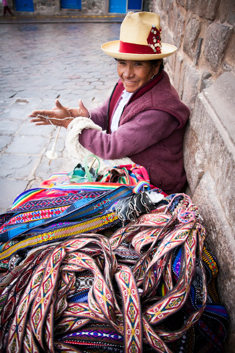 Peruvian woman spinning wool in Cuzco, Peru